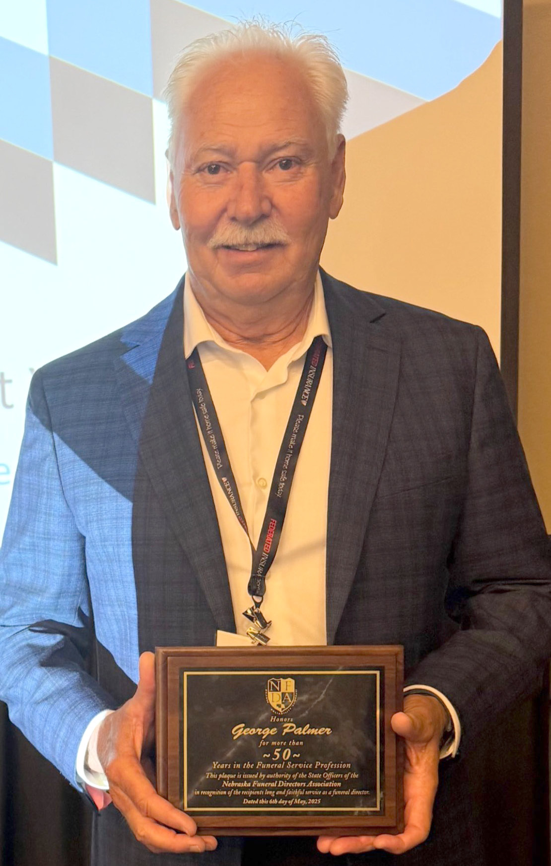 Palmer recognized for 50 years as funeral director