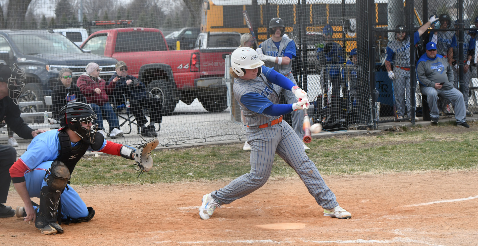 Paydon Rinkol connects on his first of two doubles on Thursday. The junior also pitched 4 strong innings for the Titans, giving up just 3 runs on 3 hits.