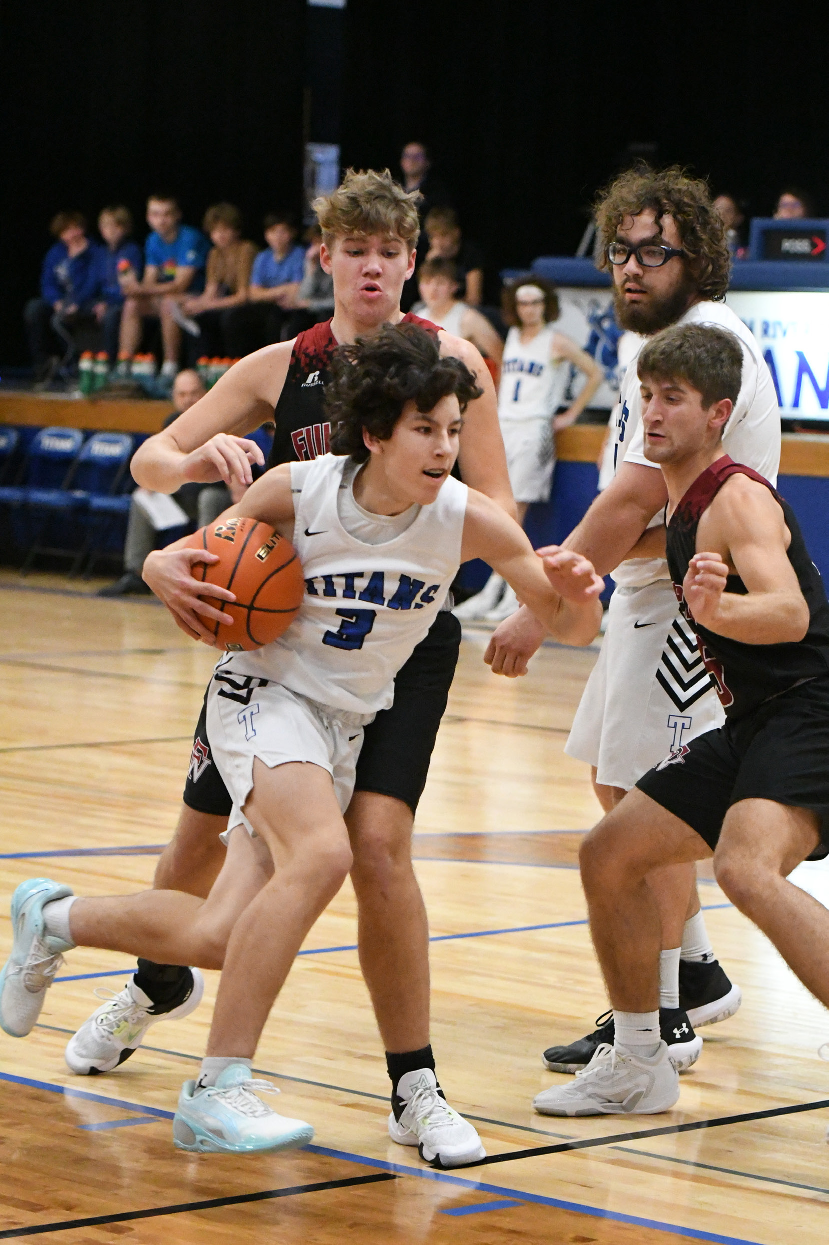 Corbin Rodriguez finds a path down the lane on his way to two points on Friday against Fullerton. NCJ photo by Rick Holtz