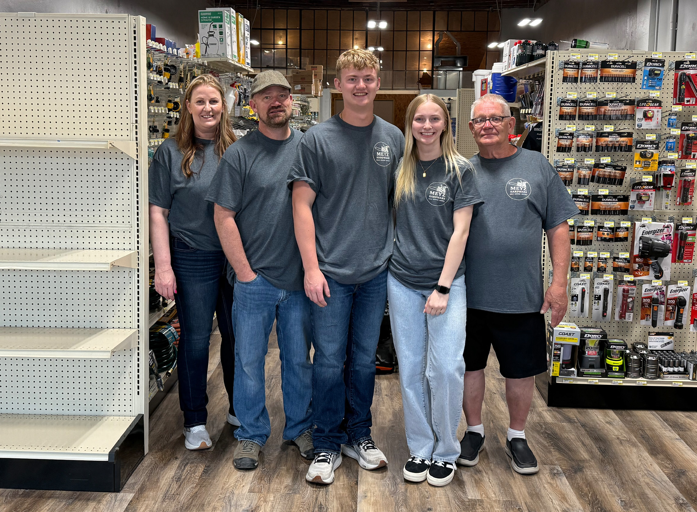 Meyz Hardware opened on Monday. Pictured are Andrea Meysenburg, Lee Meysenburg, Maxton Meysenburg, Rylyn Hemenway and Pat Meysenburg. NCJ photo by Rick Holtz