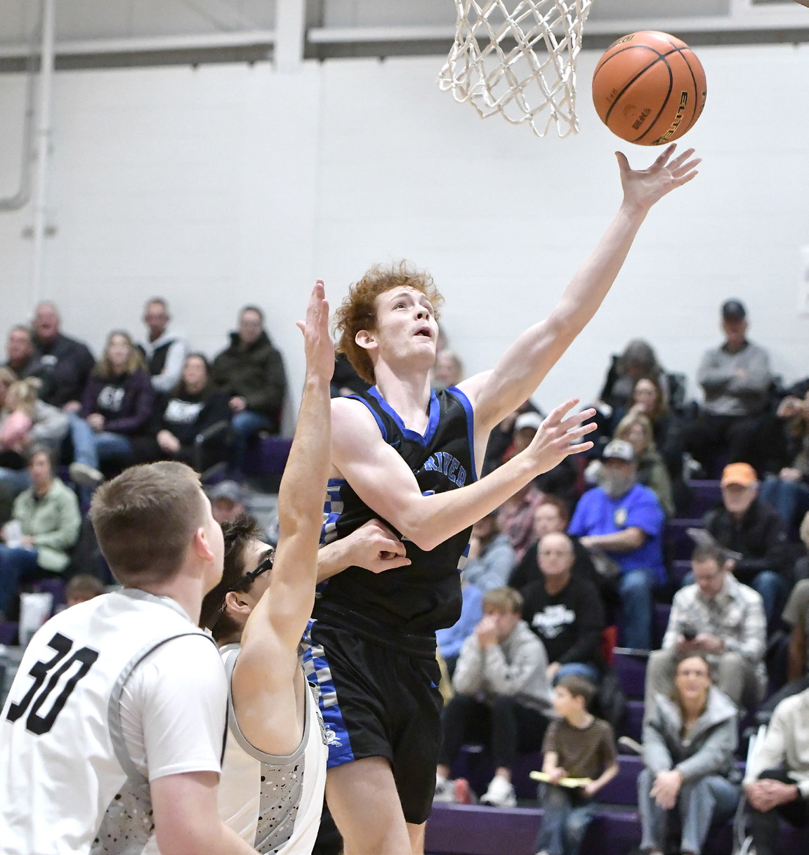 Adam de Jager finished with 5 point off the bench for Twin River on Saturday. NCJ photo by Rick Holtz