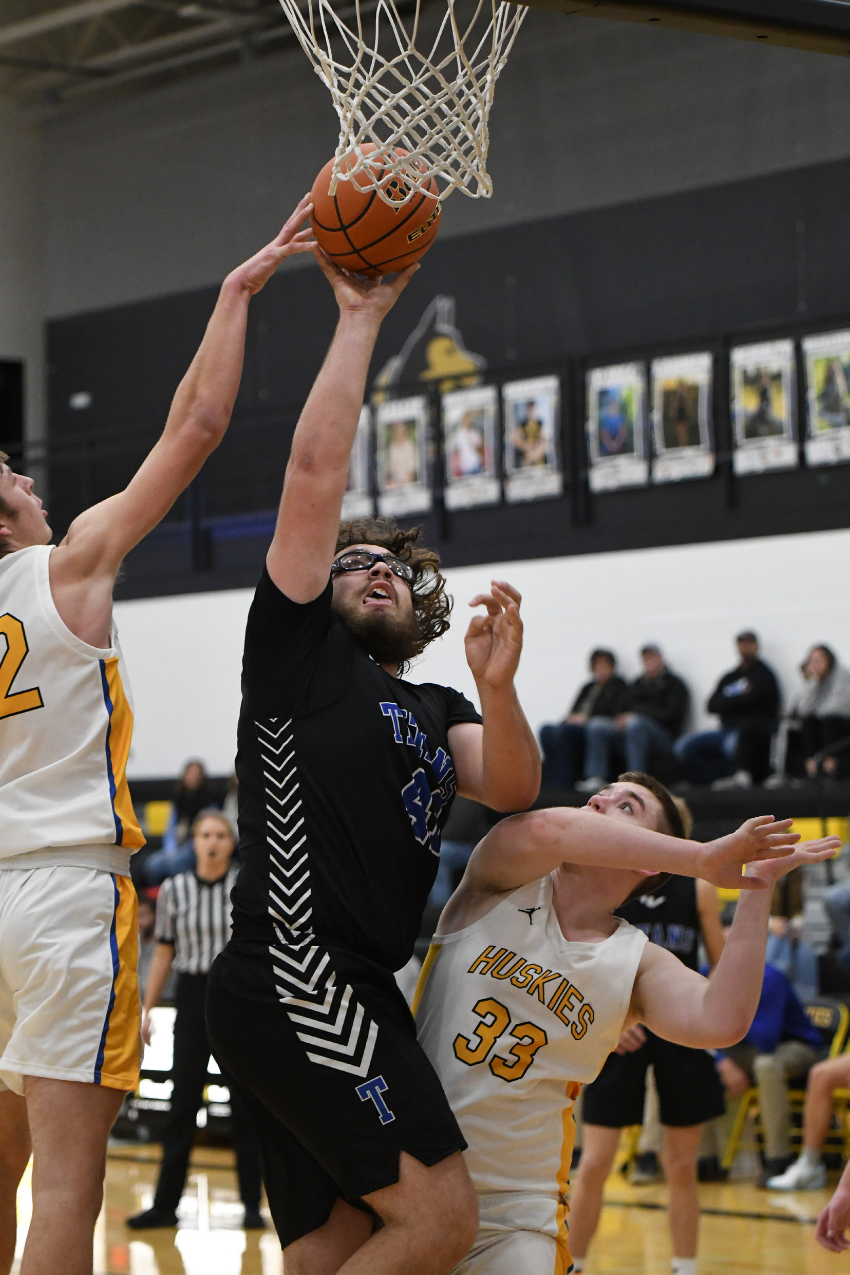 Ryder Kleckner goes up strong for two of his 6 points on Saturday against Shelby-Rising City. NCJ photo by Rick Holtz