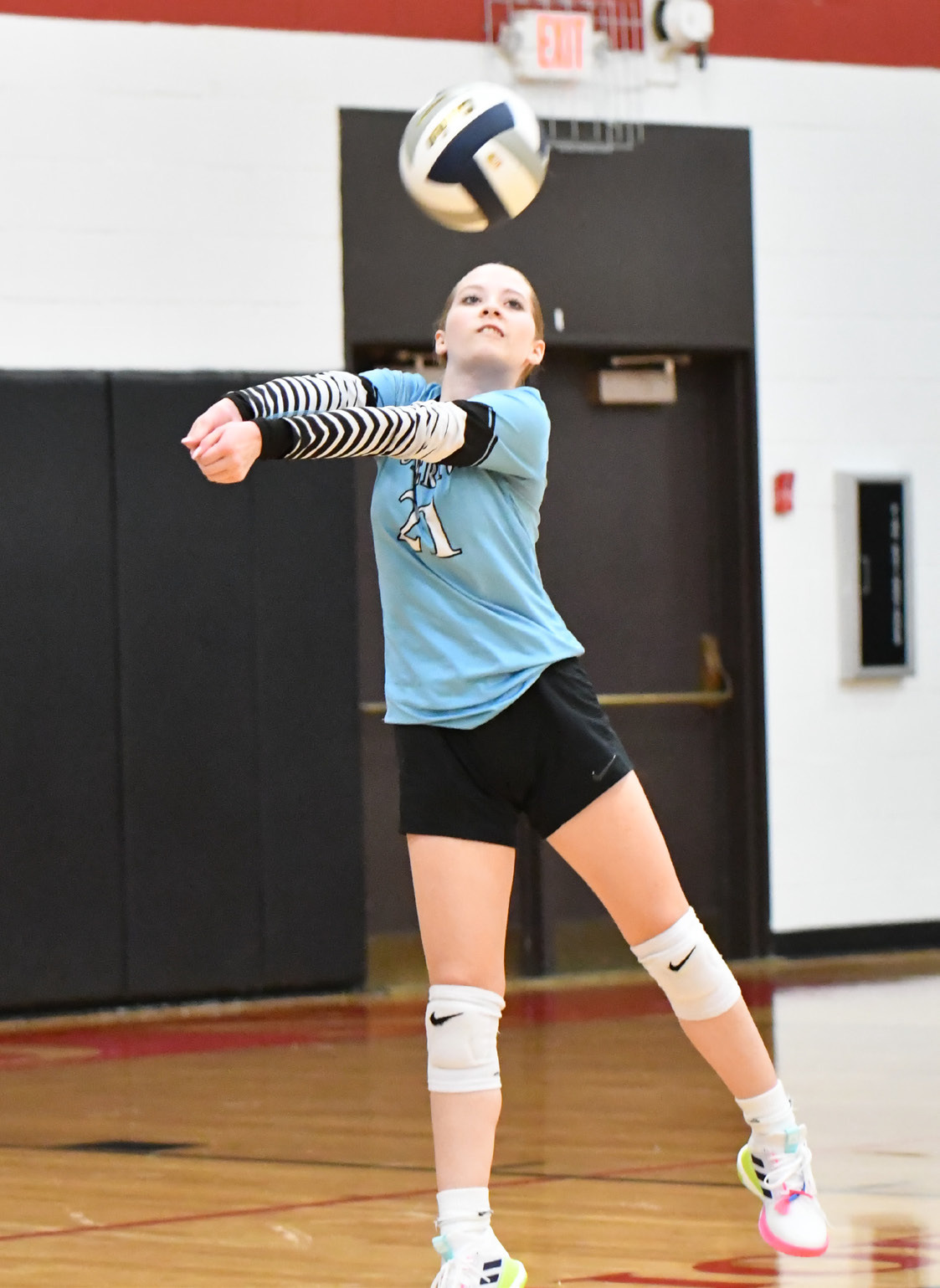 Korie Konwinski makes a play in the back row for Fullerton in the season-opener against Cross County. NCJ photo by Rick Holtz