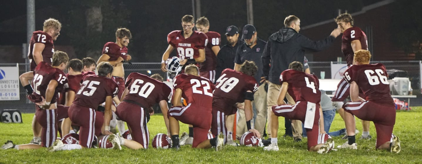Fullerton held on for a 32-24 win over Palmer on a wet Friday night. NCJ photo by Cathy Cook
