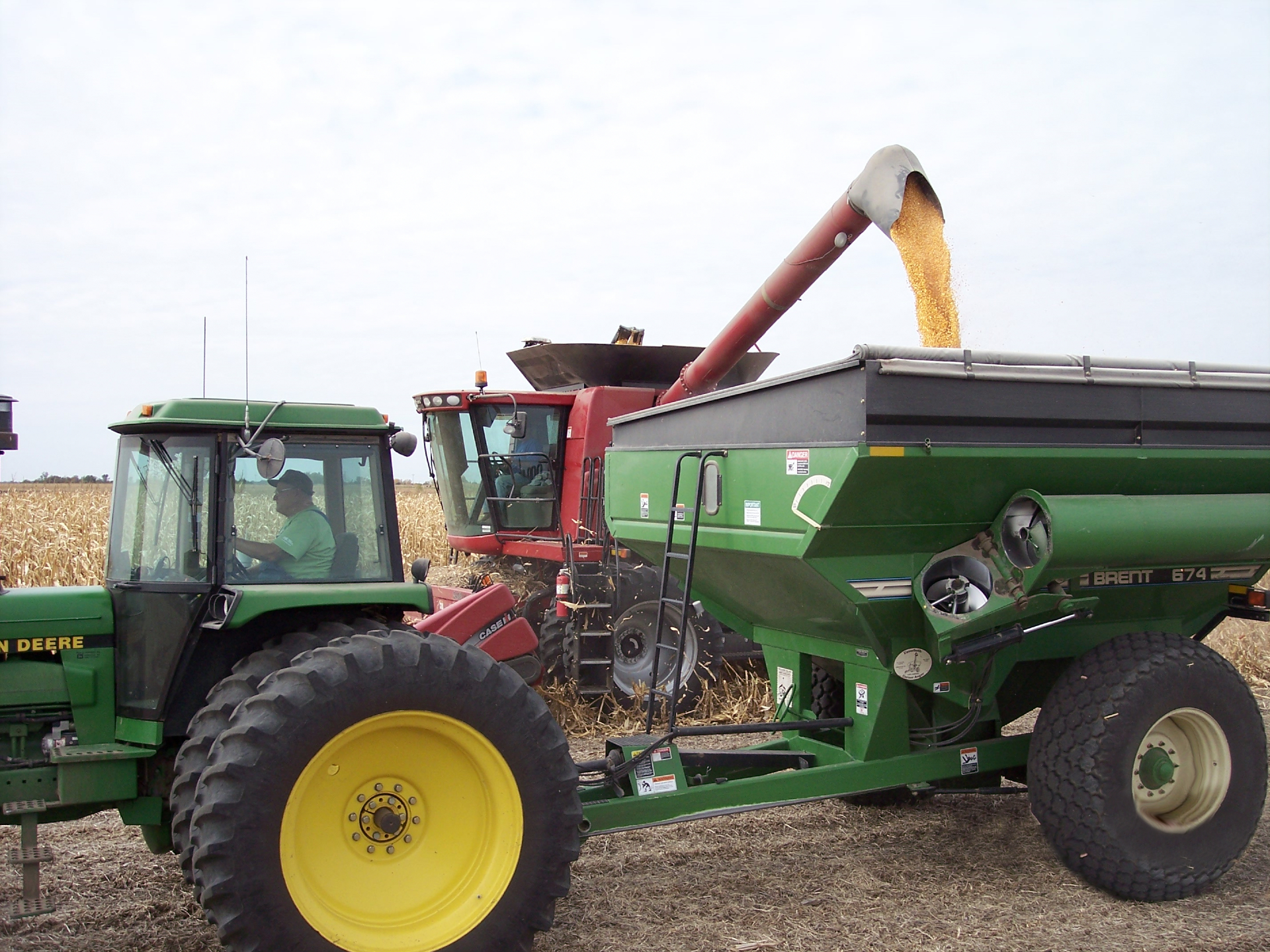 Mike McCray and his late father, Clifford, harvest together in 2010. He said harvesting has changed over the years. Photo provided