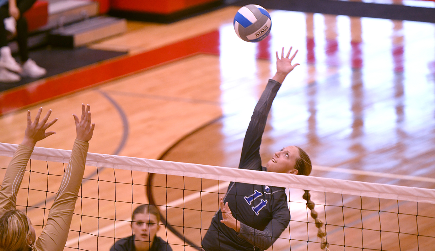 Tricia Kunkee finished with 10 kills against Madison. NCJ photo by Rick Holtz