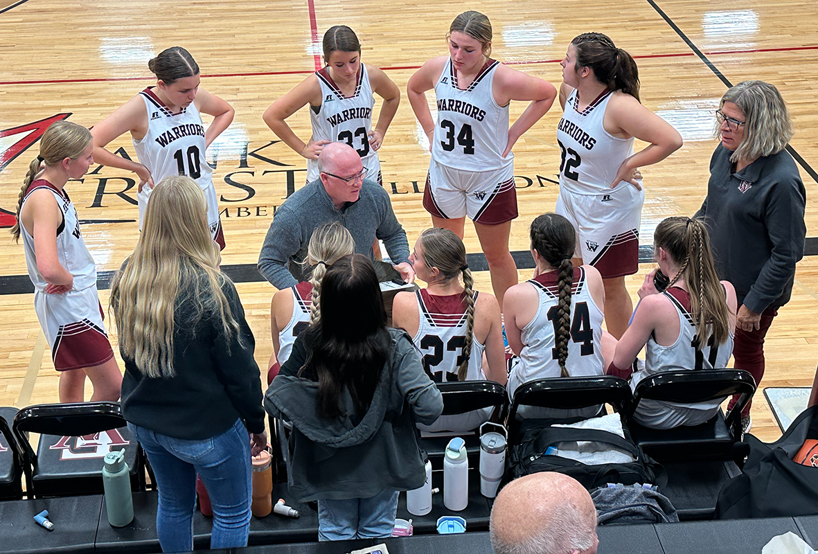 Fullerton talks things over during a timeout on Thursday. NCJ photo by Rick Holtz