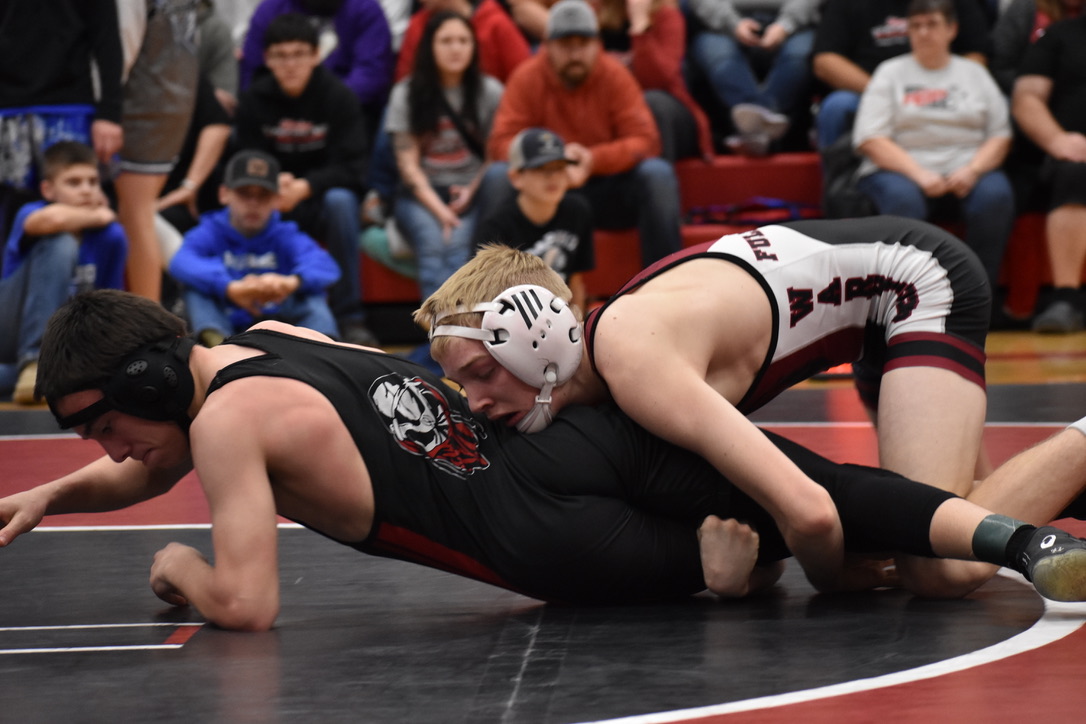 Tate Wood looks for an opening in the district meet. NCJ photo by Melissa Aaberg