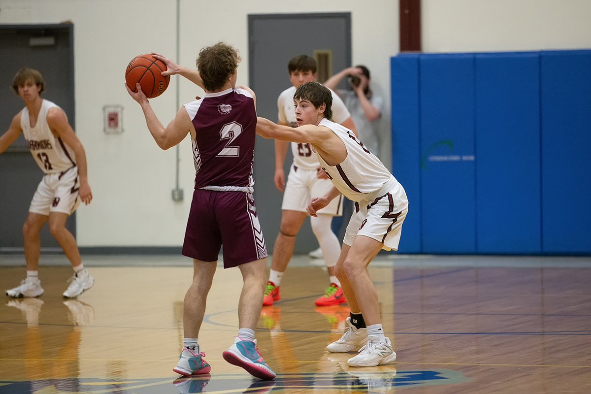 Nolan Dubas played tight defense on Monday against Neligh-Oakdale. NCJ photo by Whitney Busch