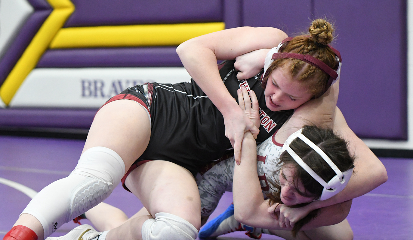 Fullerton freshman Riley Thomas takes on Lyons-Decatur Northeast sophomore in the opening round of the NSAA Girls District 1 at Battle Creek. NCJ photo by Rick Holtz