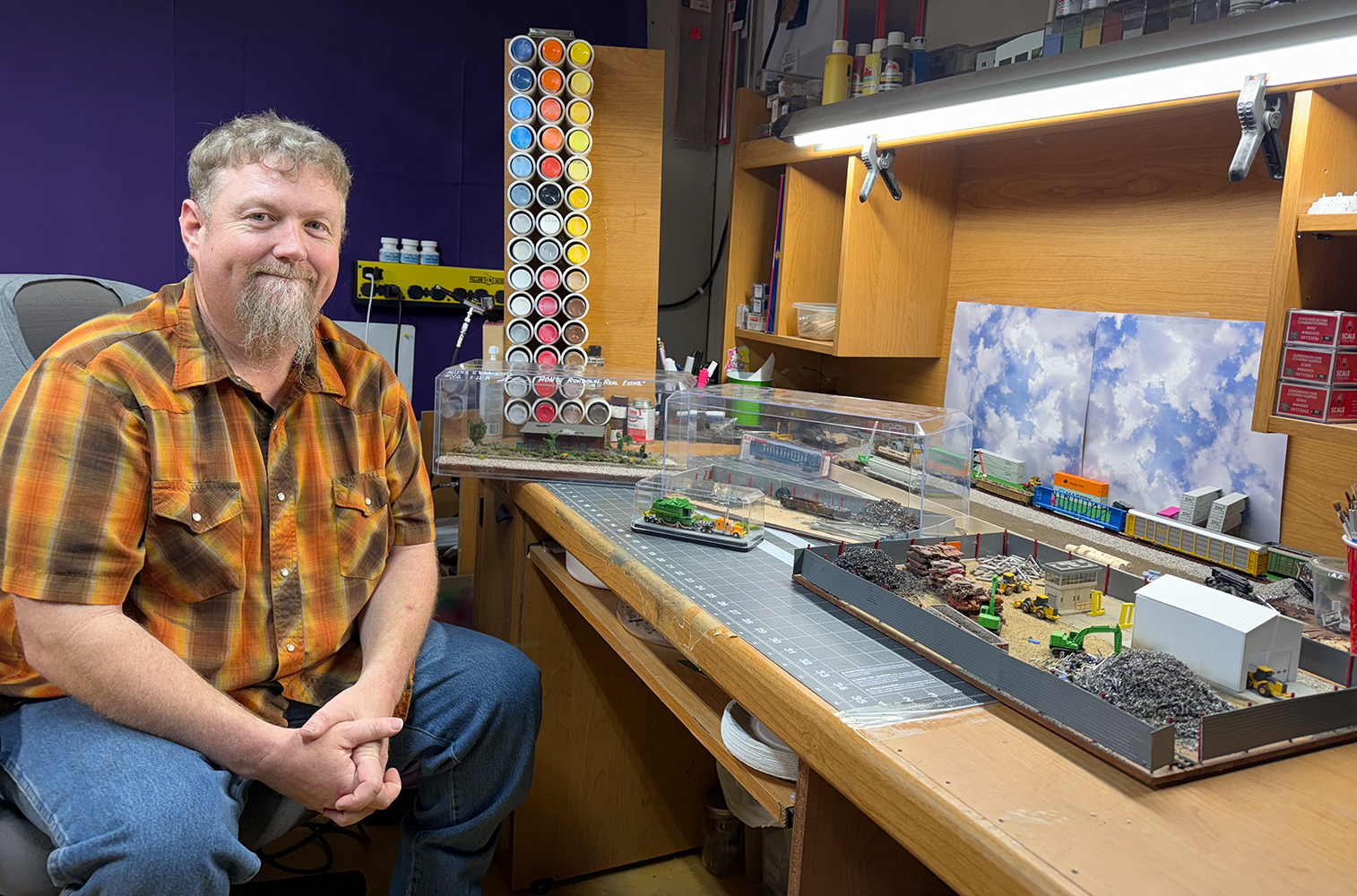 Allen Zimmerman displays some of the scenes he has created forAllen’s N Scale World. NCJ photos by Rick Holtz