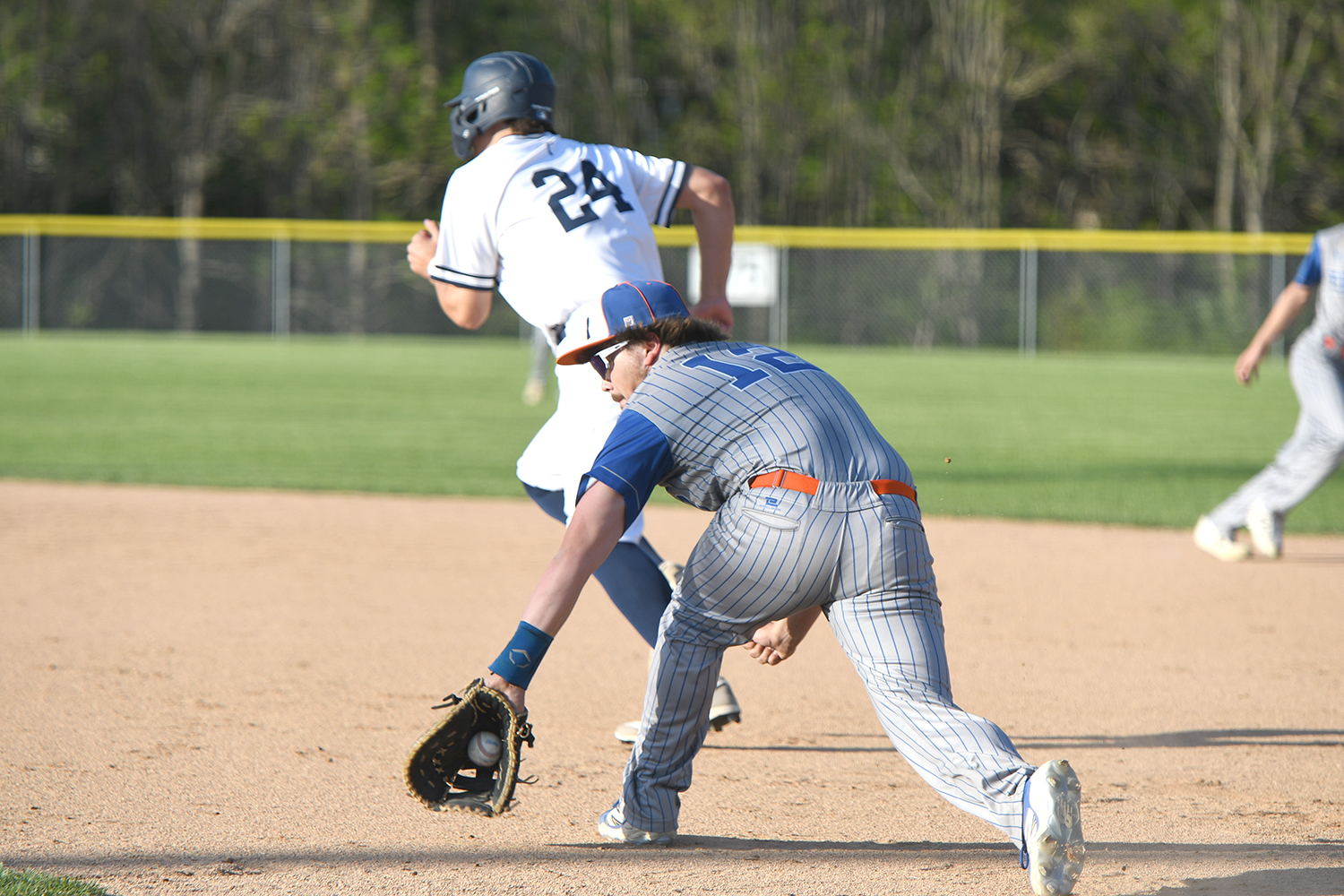 Garrett Alexander makes the play at first base during second inning. NCJ photos by Rick Holtz