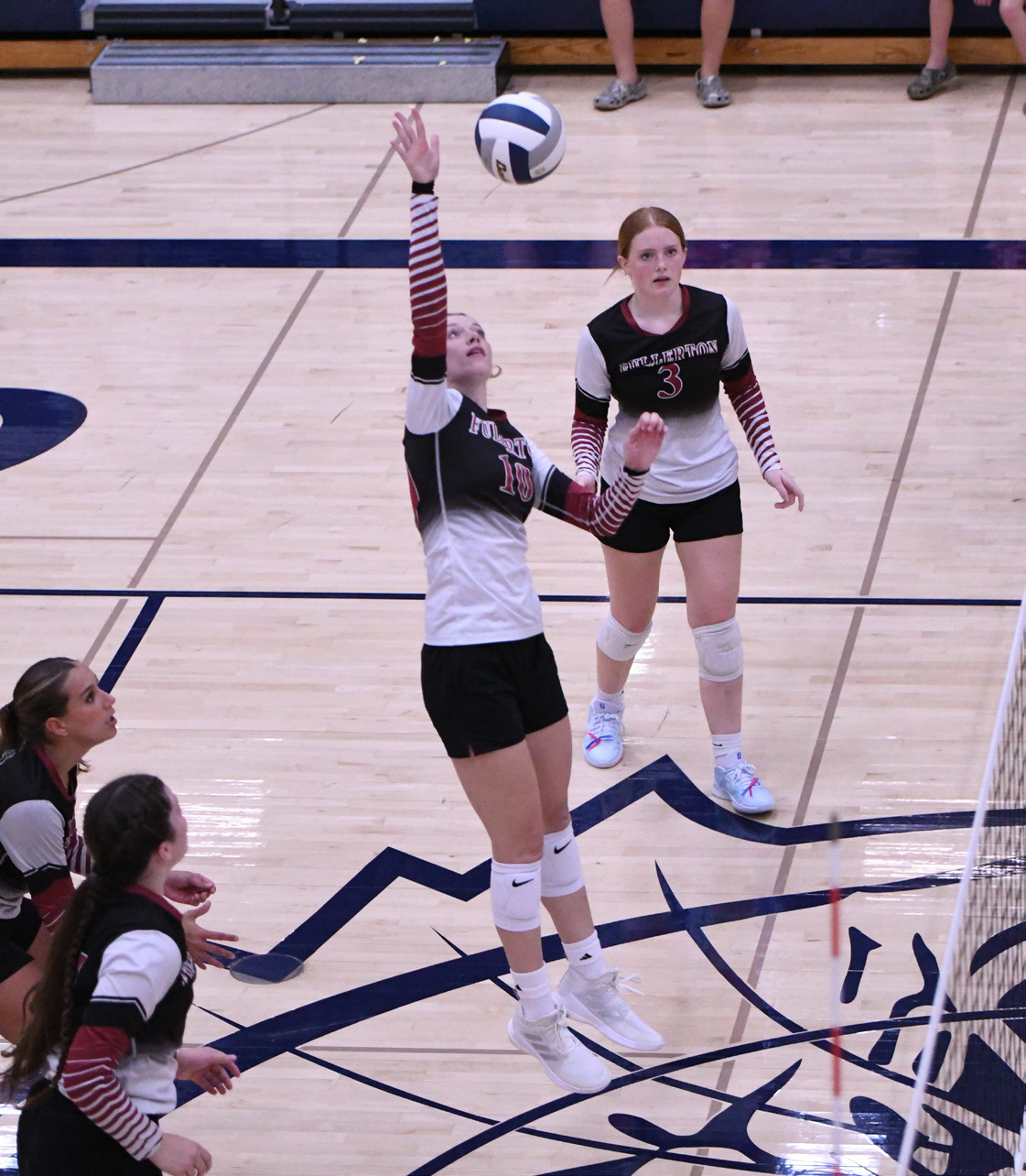 Jaci Maxfield goes on the attack for the Warriors. The senior finished with 7 kills on Thursday. NCJ photo by Rick Holtz