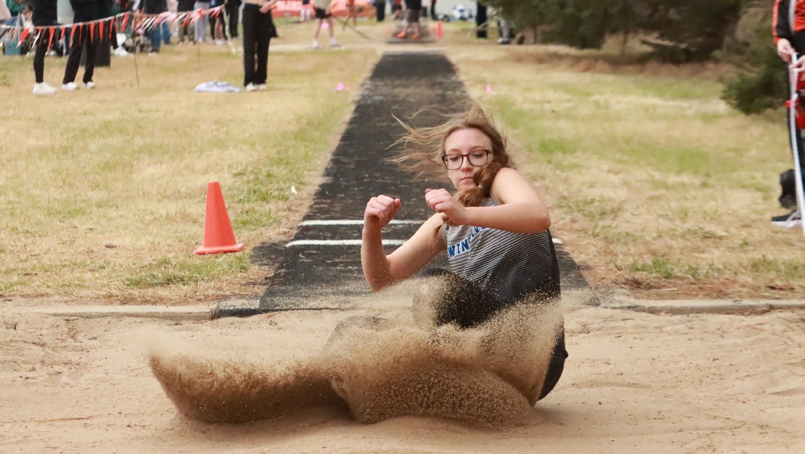 Adalyn Bishop finished seventh in the long jump at the High Plains Invite. NCJ photo by Ken Kush