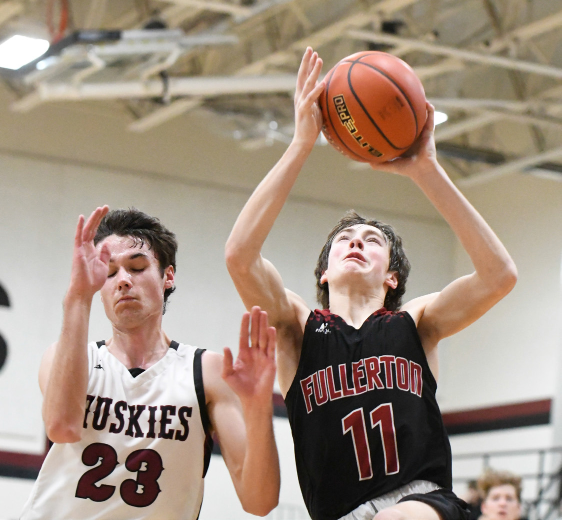 Nolan Dubas goes strong to the basket on Friday for Fullerton. NCJ photo by Calvin Holtz