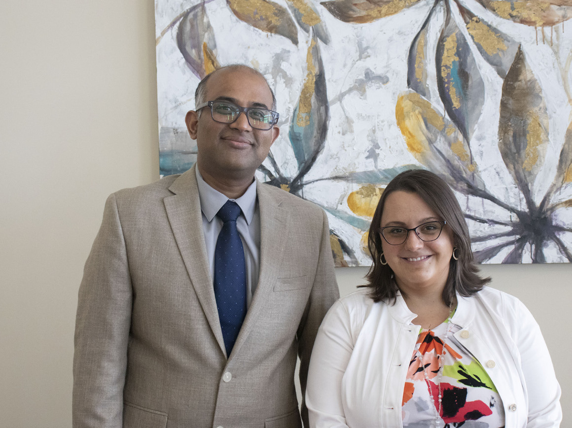 Dr. Venkata Kolli (left) welcomes Dr. Emily Royer to the Columbus Psychiatry Clinic. Photo provided