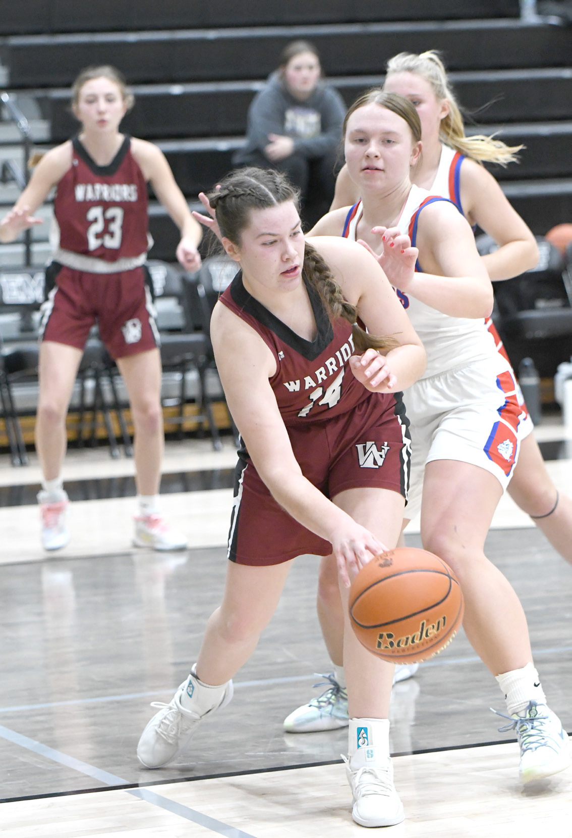 Georgia Bridger looks to find an open teammate in the paint against Humphrey-Lindsay. NCJ photo by Rick Holtz