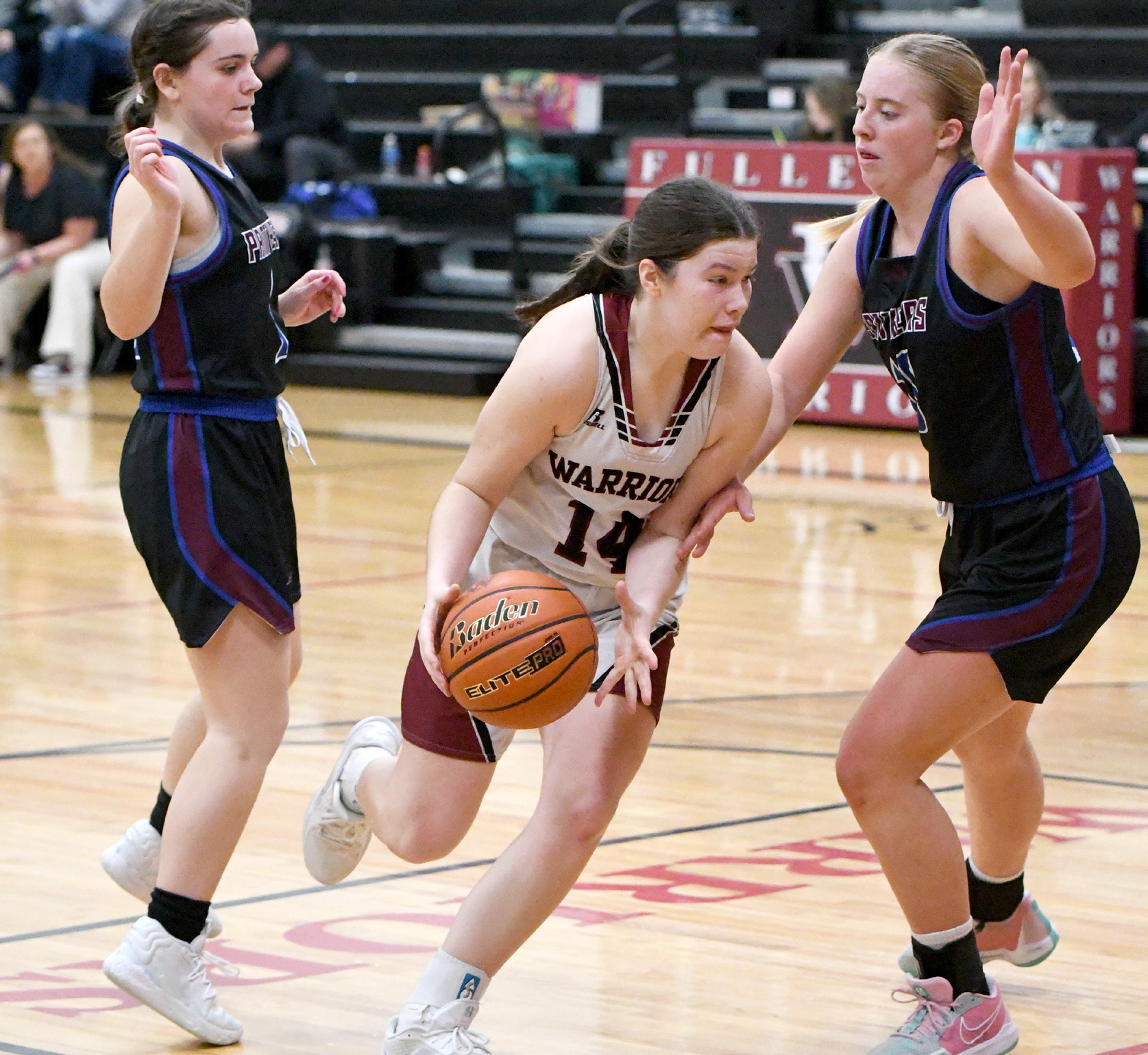 Georgia Bridger makes a move in the paint on her way to 2 of her 7 points on Saturday. NCJ photo by Rick Holtz