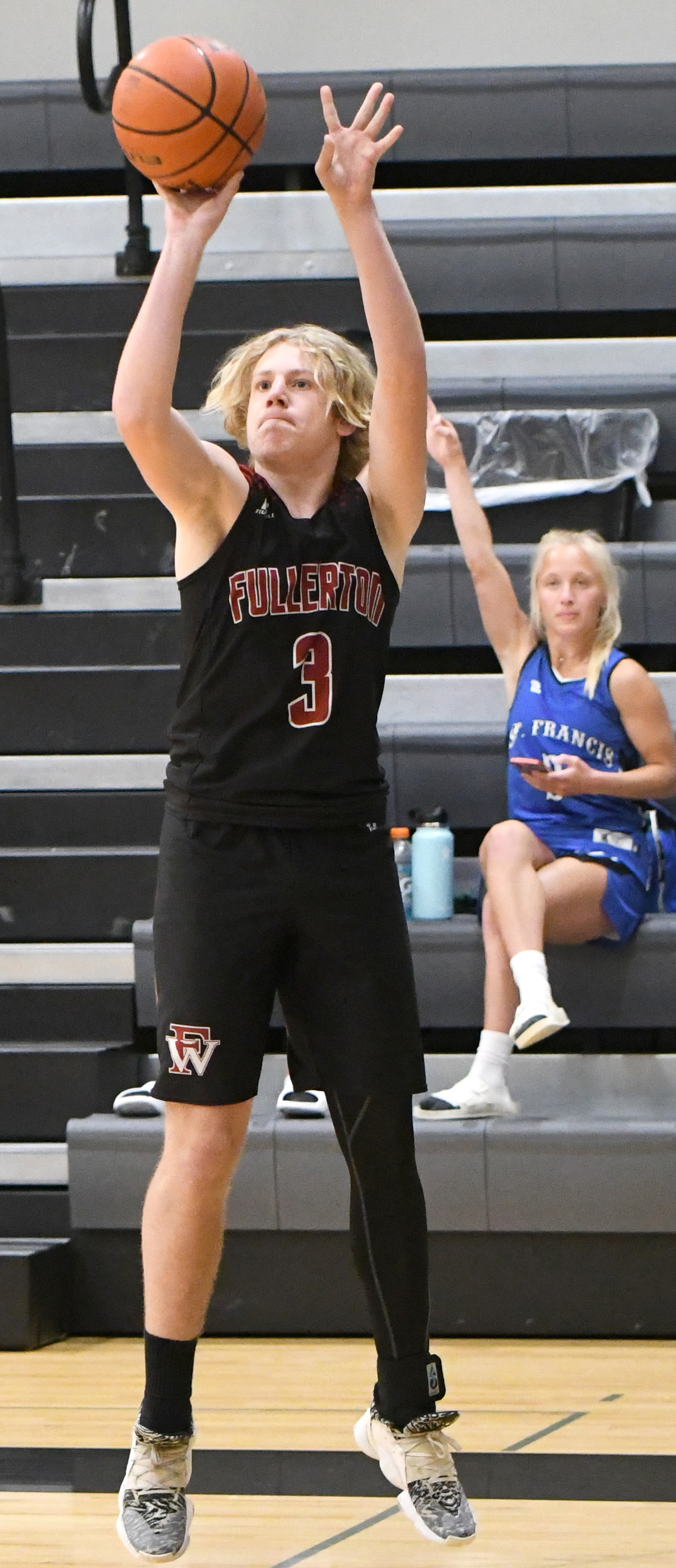 Tyler Gochenour knocks down a wide open long-range shot in the first overtime.  NCJ photos by Rick Holtz