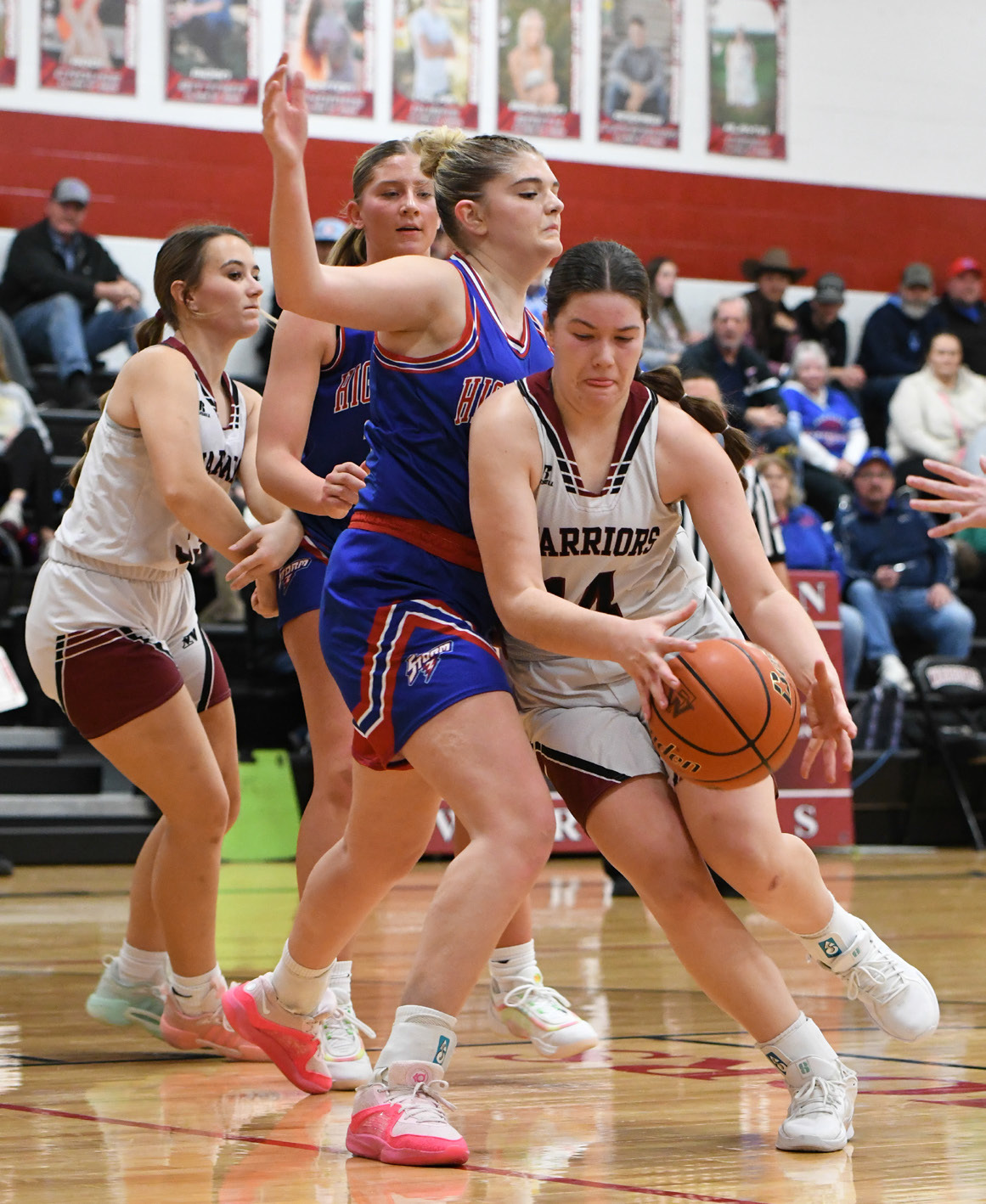 Georgia Bridger makes a strong move in the post against the bigger High Plains defender. NCJ photo by Rick Holtz