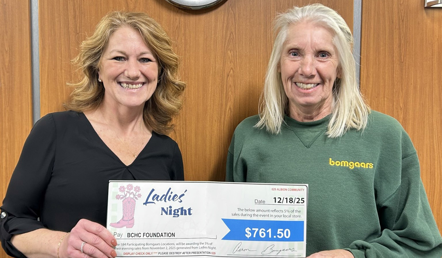 Cindy Bolin, General Manager of the Albion Bomgaars location, presents a donation check to Sarah Grape, BCHC Foundation Director. Photo provided