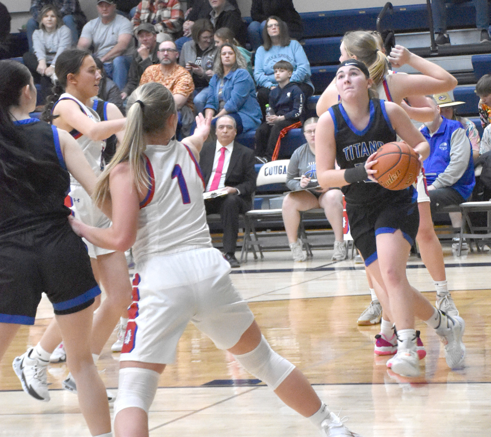 Delaney Reeg drives to the basket on Monday against Humphrey/Lindsay Holy Family. The Twin River senior finished with a team-high 19 points. NCJ photo by Beth Sparrow