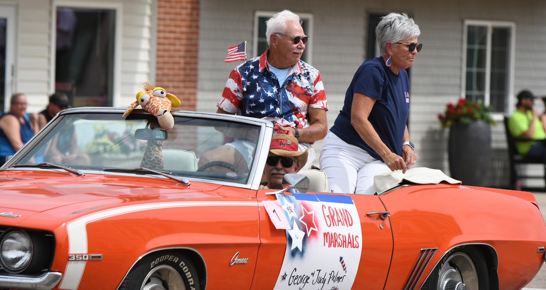 Fullerton residents lined Broadway on Friday for the parade to celebrate the Fourth of July. People on floats threw candy and other items, waved at the crowd as they passed by. The majority of the crowd wore red, white and blue and other summer related outfits. The parade capped the day of festivities. NCJ photos by Rick Holtz
