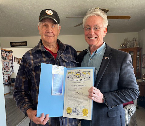 Dale Quick (left) was presented with an Admiralship in the Nebraska Navy by State Senator Loren Lippincott. Photo provided