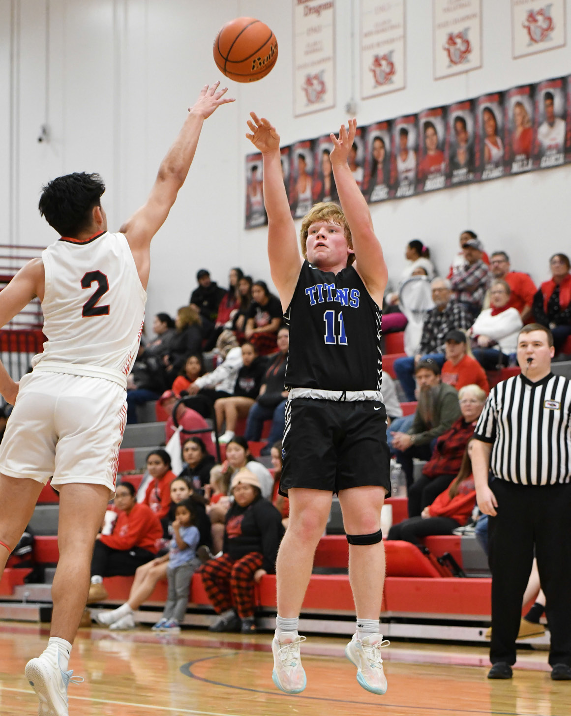Paydon Rinkol fires from long-range in the first half on Saturday against Madison. NCJ photo by Rick Holtz