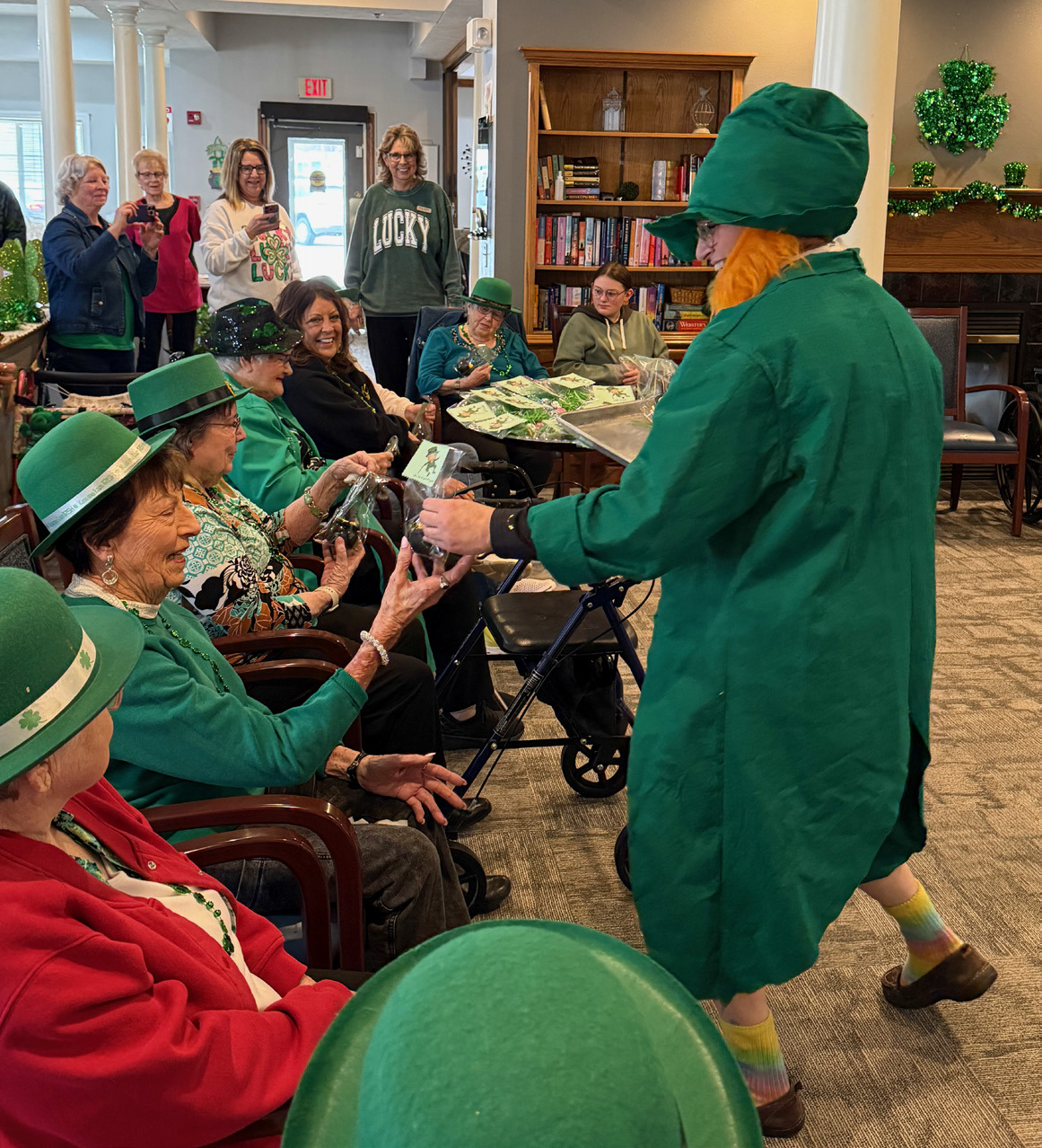 The residents at Valley View Assisted Living celebrated St. Patrick’s Day in style on Tuesday. In addition to a little live entertainment, complete with Irish songs and a few jokes, the residents were greeted by a happy (and hoppy) leprechaun. The residents had the chance to try a few special dishes and even sample a selection of green beverages. NCJ photo by Rick Holtz