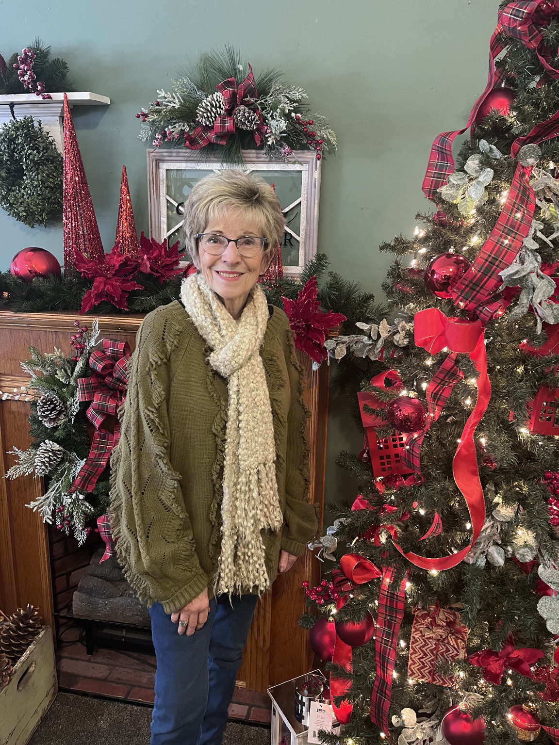 Deb Bittner stands in her shop. NCJ photo by April Carr