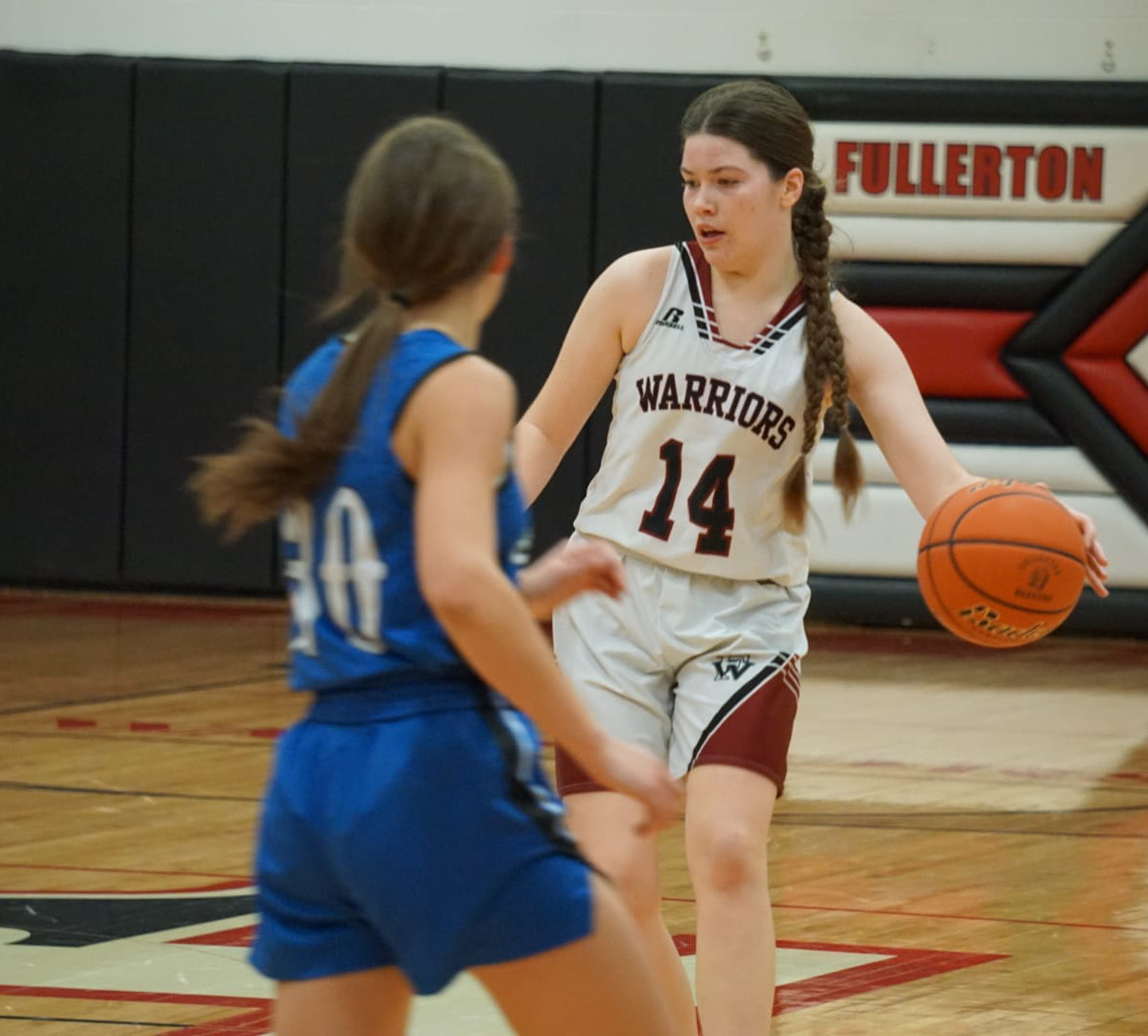 Georgia Bridger works to move the ball against the St. Francis pressure defense on Saturday. NCJ photo by Cathy Cook