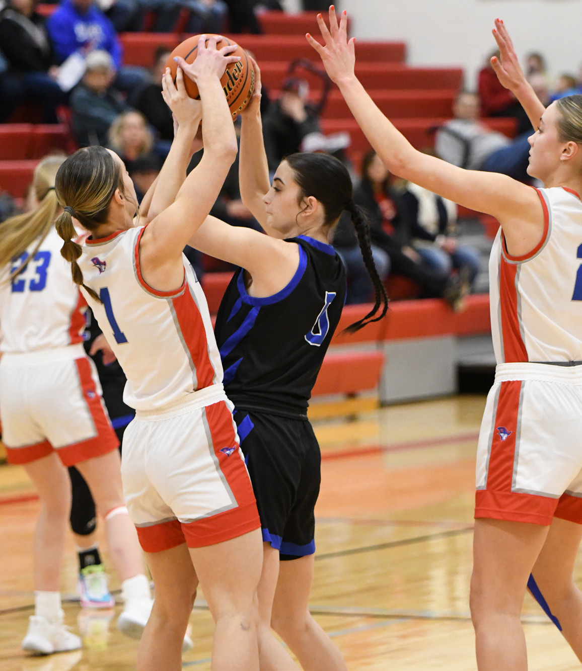Taylor Pearson fights for possession of the ball in the first half on Friday. NCJ photo by Rick Holtz