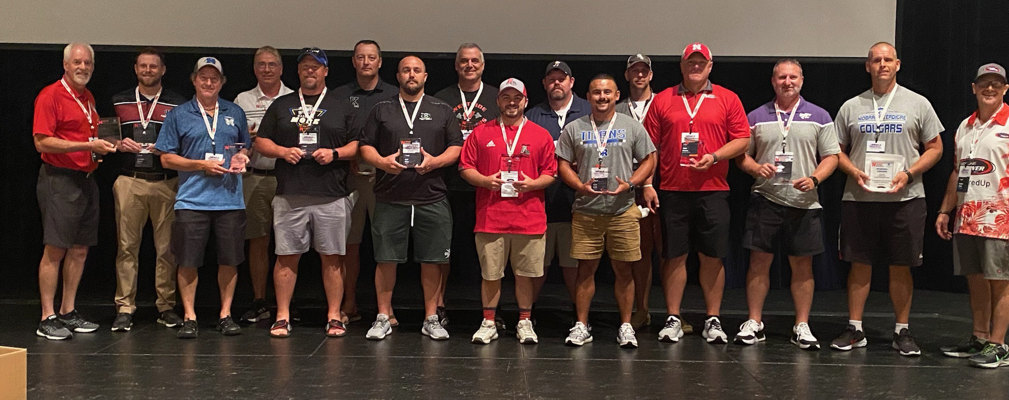 Fullerton football coach Brandon Siegal and Twin River football coach Kalin Koch were among the coaches who accepted an academic award on behalf of their teams at the NCA Coaches Clinic in Lincoln. Photo provided