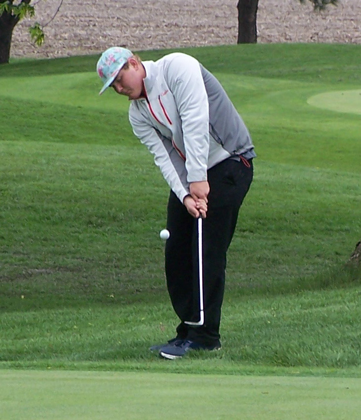 Jerrod Land hits a chip shot onto the second green at Monday’s D-2 District at Twin Creek Golf Course. Photos provided