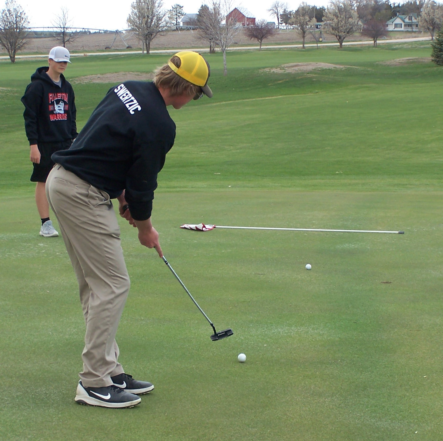 Trey Swertzic looks to sink a putt at Pawnee Hills Golf Course on Monday. Fullerton Schools photos