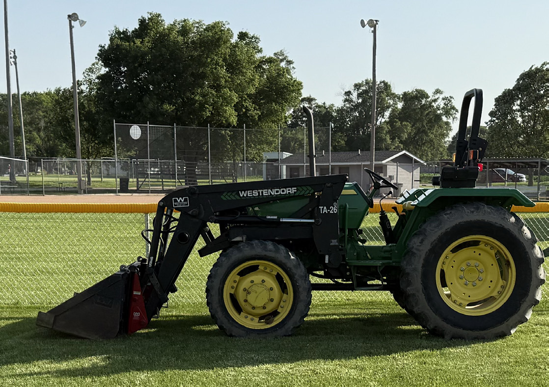 The Nance County Ag Society recently purchased a 2011 John Deere 5075E tractor. They also installed a new fence in the outfield of the ballfields. Photo provided