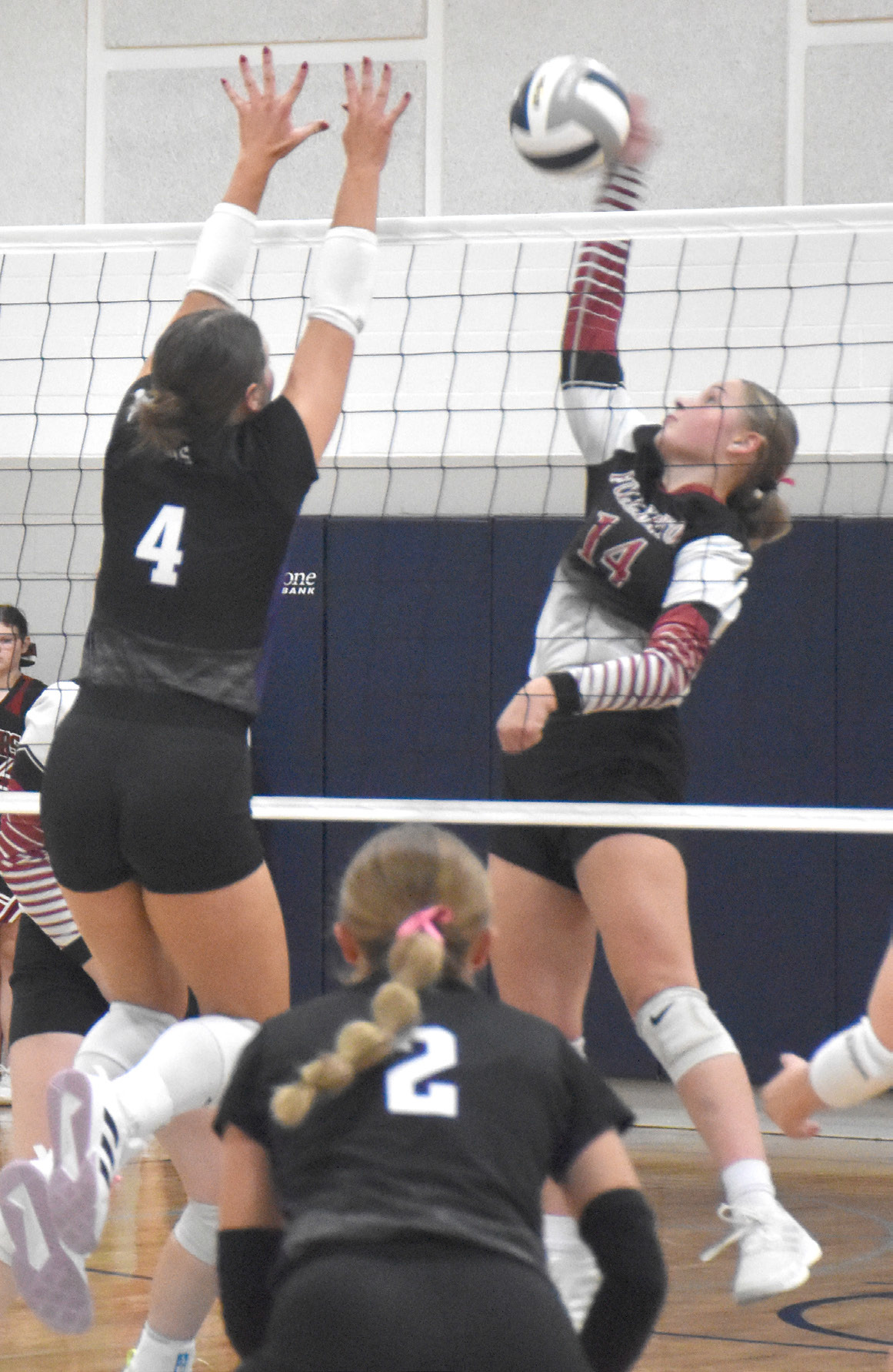 Kaycee Harter had 7 kills for the Warriors in their conference opener against Burwell. NCJ photo by Beth Sparrow.