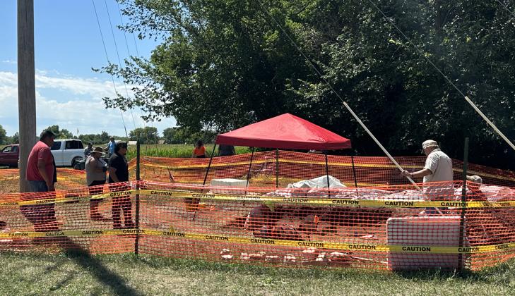 A team of archeologists dig at the site that could be the lost cemetery connected to the Genoa Indian Industrial School. The cemetery was lost to time after the Native American boarding school closed in 1931. NCJ photo by Rick Holtz
