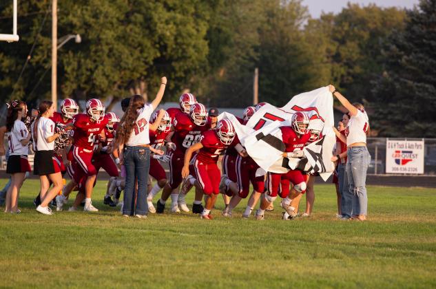 The Fullerton football team takes the field for Friday’s Homecoming game against Twin River. The Warriors defeated the Titans 50-15. Complete coverage can be found today on page 6. NCJ photo by Whitney Busch