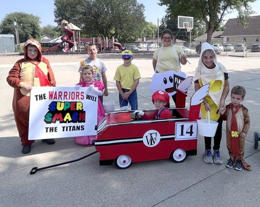 In the business category, the First Bank and Trust won first with their float, “The Warriors will Super Smash the Titans.”