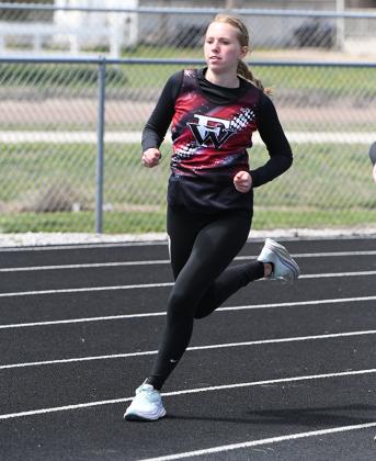 Emilyn Kurz finished 8th in the 800-meter run with a time of 3:07.40. NCJ photo by Rick Holtz