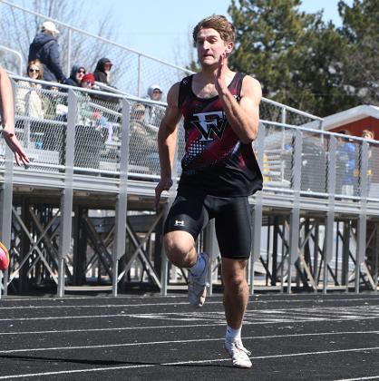 Fletcher Dubas finished third in the 100-meter dash with a time of 11.68. NCJ photo by Rick Holtz