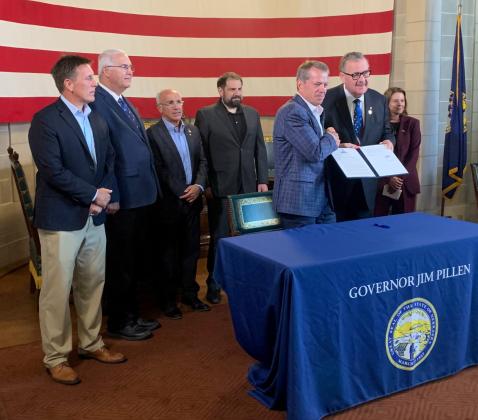Gov. Jim Pillen displays signed executive order. Photo provided