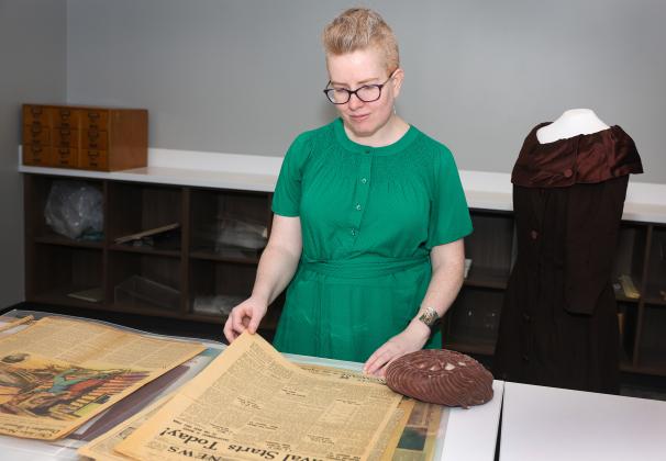 UNK archivist Laurinda Weisse shows off items in the Mari Sandoz collection. Photo by Erika Pritchard, UNK Communications