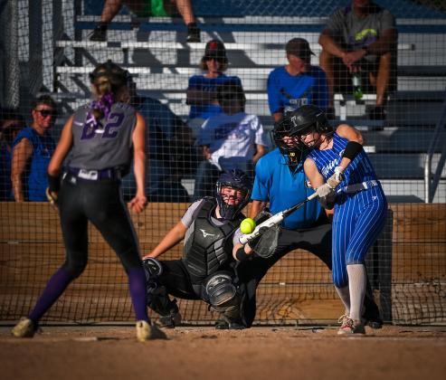 Adalyn Bishop cleared the bases with one swing of the bat. She launched a grand slam against Highway 91. NCJ photo by Jen Johnson