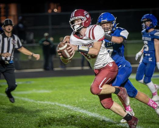 Landen Glup reaches the ball across the goal line to give Fullerton an early lead on Friday at Kenesaw. NCJ photo by Rick Holtz