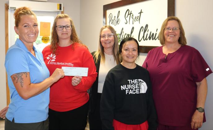 Cornhusker Public Power District Goodwill Fund Trustee Abie Czapla (left) presents $500 to Park Street Medical Clinic for an AED. Accepting the check are (left to right) Office Manager Amber Zoucha, Rescue Squad Member Timber de Jager, LPN Suzanne Korus, and LPN Jackie Peterson. Photos provided