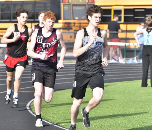 LEFT: Maja Fabian finished 15th in the discus throw. RIGHT: Micah Stenzel finished third in the 1600-meter run with a time of 5:18.52. NCJ file photos