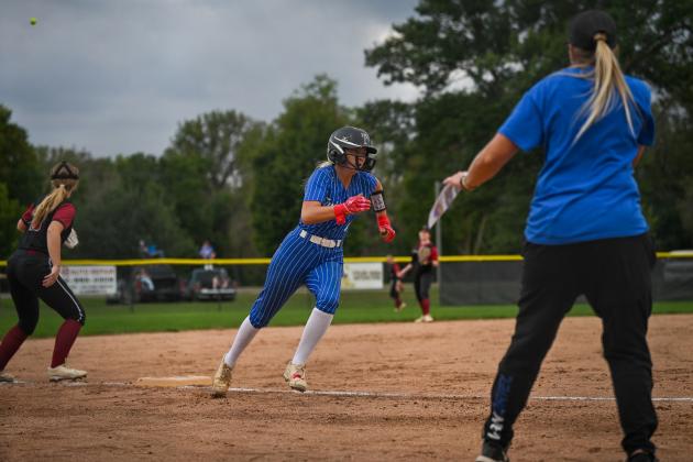 Mya Ramaekers went 3-for-4 with a pair of triples on Monday night for the Titans. NCJ photo by Jen Johnson